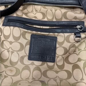 COACH SLIM VINTAGE BLACK 9188
Approximate measurements: 12"L x 3.5"W x 12.5"H